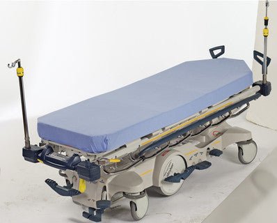 Medical stretcher with blue mattress on a white background - okotoks hc pharmacy