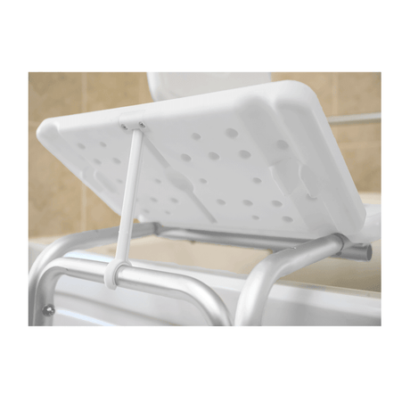 White shower seat with perforated design on a tiled bathroom wall background - okotoks hc pharmacy