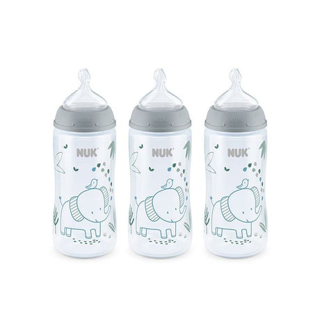 Three NUK baby bottles with elephant design on a white background - okotoks hc pharmacy