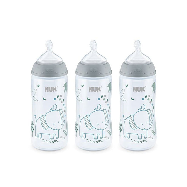 Three NUK baby bottles with elephant design on a white background - okotoks hc pharmacy