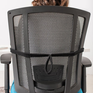Person sitting on a black office chair with mesh backrest - okotoks hc pharmacy