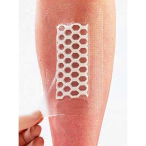 Hexagonal patterned patch on a person's leg with a white background - okotoks hc pharmacy