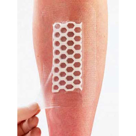 Hexagonal patterned patch on a person's leg with a white background - okotoks hc pharmacy