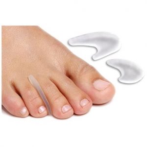 Bunion corrector on a foot with a white background - okotoks hc pharmacy