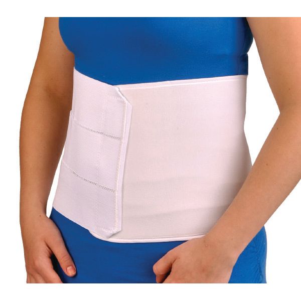 Person wearing a white waist support belt over a blue shirt and pants on a white background - okotoks hc pharmacy