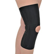 Black knee brace on a person's knee against a white background - okotoks hc pharmacy