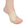 Beige bunion corrector on a foot against a white background - okotoks hc pharmacy