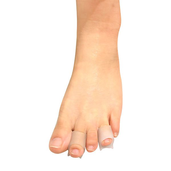Toe separator on a foot against a white background - okotoks hc pharmacy