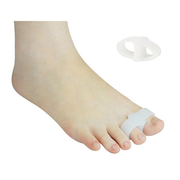 Bunion corrector on a foot with a white background - okotoks hc pharmacy