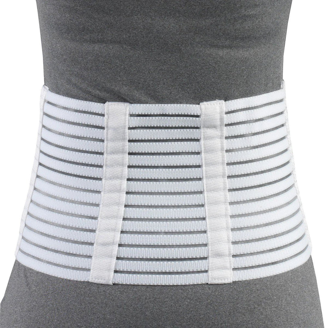 White compression wrap on a person wearing a gray shirt against a white background - okotoks hc pharmacy
