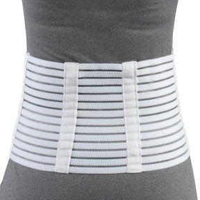 White compression wrap on a person wearing a gray shirt against a white background - okotoks hc pharmacy
