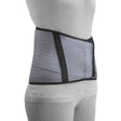 Gray back brace worn by a person on a white background - okotoks hc pharmacy