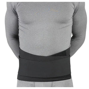 Person wearing a gray long-sleeve shirt and gray shorts with a black compression wrap on a white background - okotoks hc pharmacy