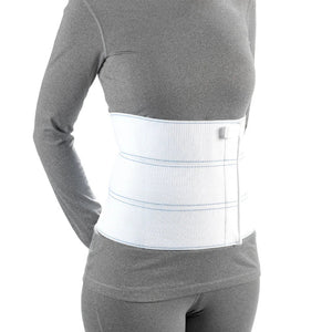 Person wearing a white waist support belt on a white background - okotoks hc pharmacy