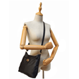 Black handbag on a mannequin with a white background - okotoks hc pharmacy