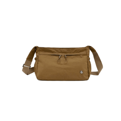 Brown shoulder bag on a white background - okotoks hc pharmacy
