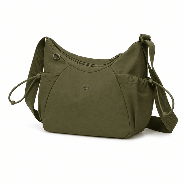 Green shoulder bag on a white background - okotoks hc pharmacy