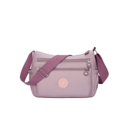 Pink handbag with a visible brand logo on a white background - okotoks hc pharmacy
