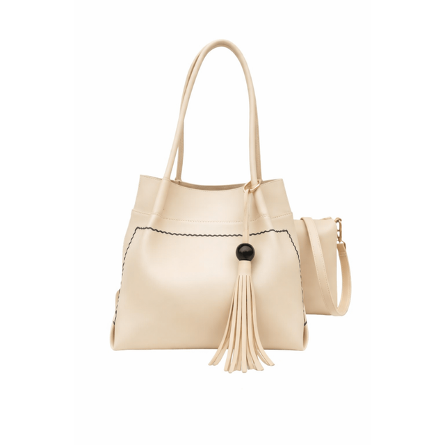 Beige handbag with tassel detail on a white background - okotoks hc pharmacy