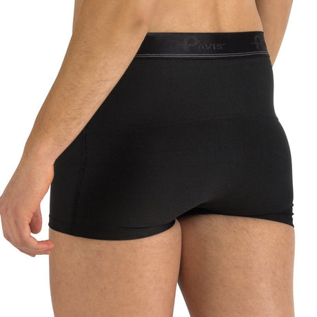 Rear view of a person wearing black high-waisted briefs with a dark gray waistband featuring the Pavis logo. - okotoks hc pharmacy