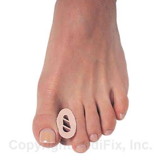 Toe separator on a foot with a white background - okotoks hc pharmacy