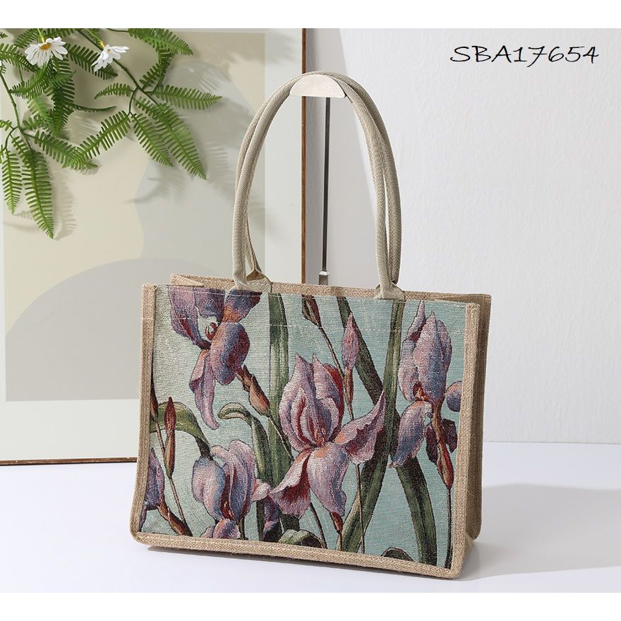 Floral-patterned tote bag on a white surface with a neutral background - okotoks hc pharmacy