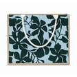 Floral-patterned bag with a white handle on a light blue background - okotoks hc pharmacy