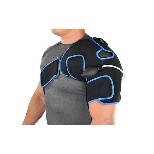 Person wearing a black shoulder brace with blue accents on a white background - okotoks hc pharmacy