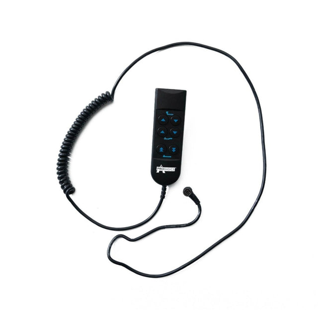 Black coiled cable with a remote control on a white background - okotoks hc pharmacy