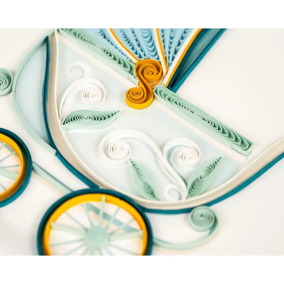 Quilled paper art with intricate patterns and colors on a white background - okotoks hc pharmacy