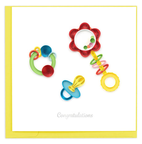 Colorful baby toys on a white background with 'Congratulations' text. - okotoks hc pharmacy
