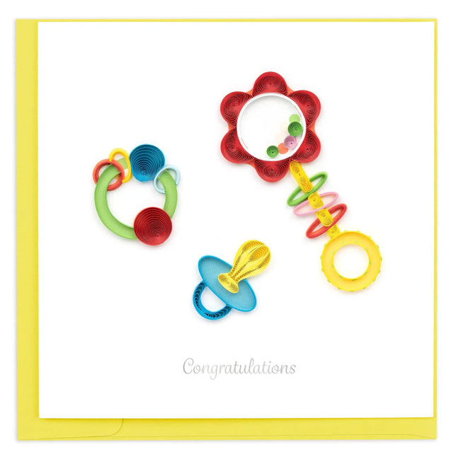 Colorful baby toys on a white background with 'Congratulations' text. - okotoks hc pharmacy