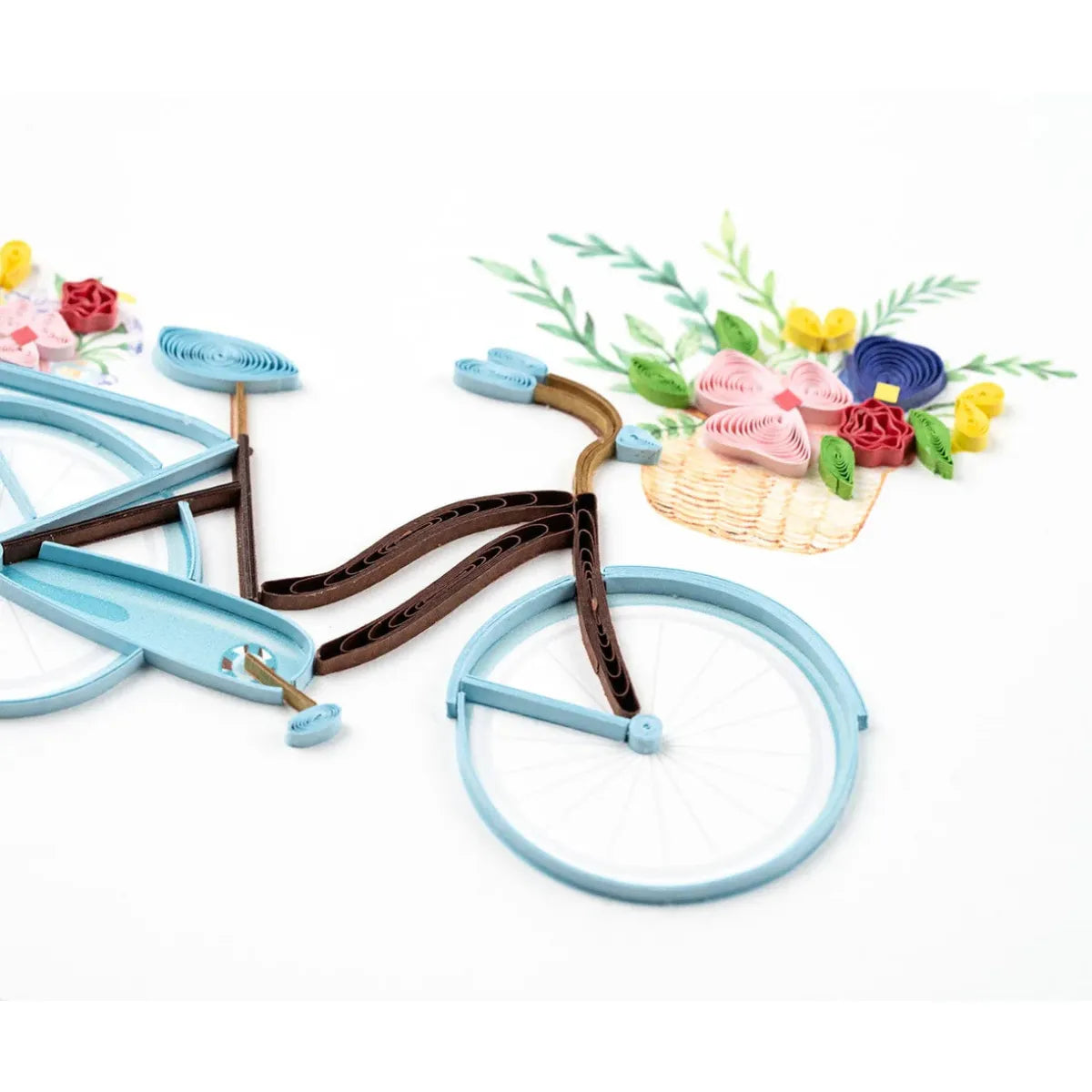 Decorative bicycle model with flowers on a white background - okotoks hc pharmacy