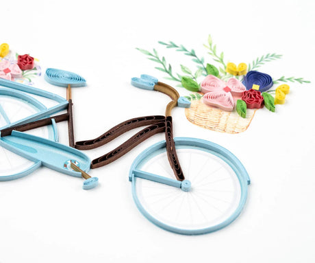 Decorative bicycle model with flowers on a white background - okotoks hc pharmacy