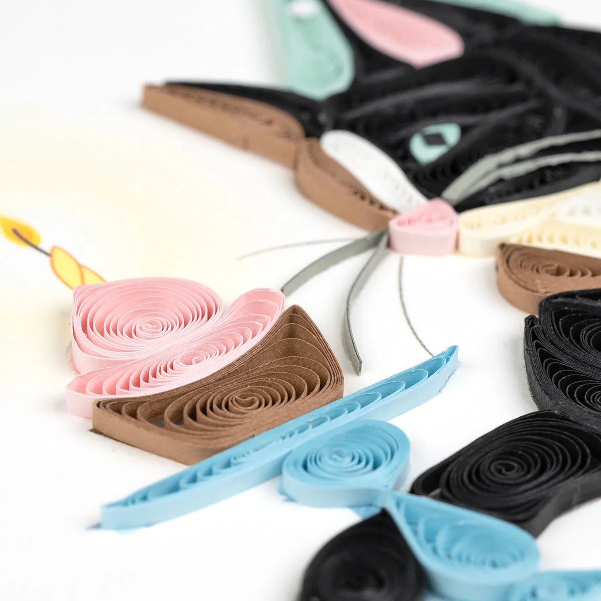 Colorful paper flowers on a white background - okotoks hc pharmacy