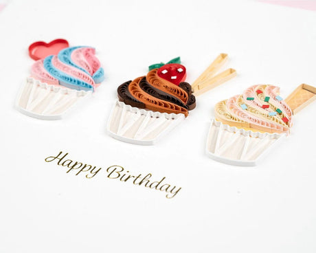 Three colorful cupcake-shaped cookie cutters on a white background with 'Happy Birthday' text. - okotoks hc pharmacy