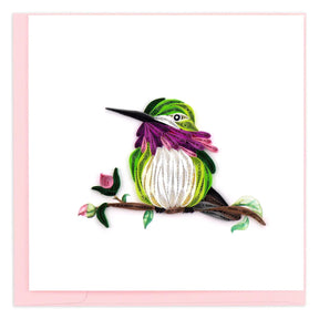 Quilled art of a hummingbird on a branch with a pink card - okotoks hc pharmacy