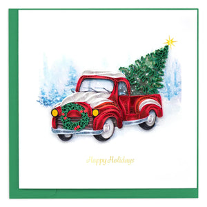 Red truck with Christmas tree and wreath on a snowy background, 'Happy Holidays' text. - okotoks hc pharmacy