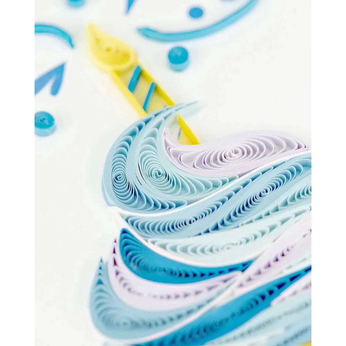 Close-up of colorful quilled paper art on a white background - okotoks hc pharmacy