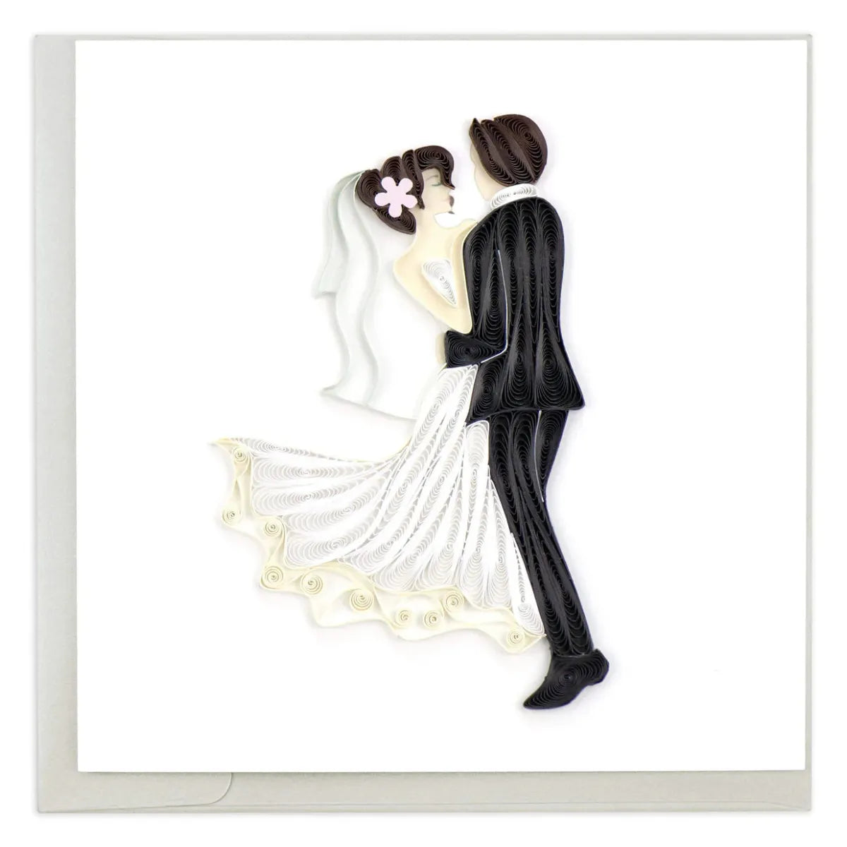 Decorative figurine of a bride and groom on a white background - okotoks hc pharmacy