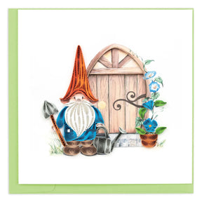 Quilled gnome with a wooden door and flowers on a white background - okotoks hc pharmacy