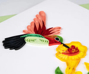 Colorful paper quilling art on a white background - okotoks hc pharmacy