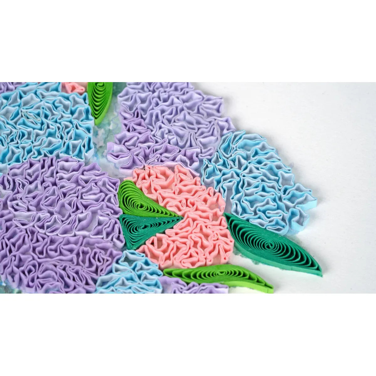 Colorful textured paper flowers on a white background - okotoks hc pharmacy