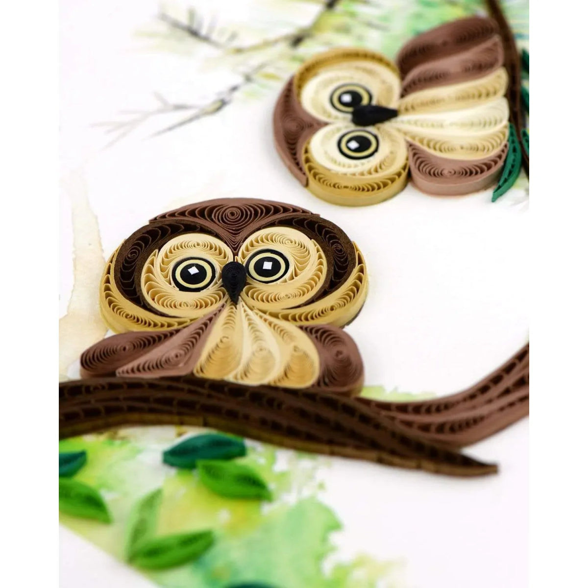 Quilled owl design on a white background - okotoks hc pharmacy