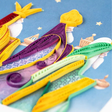 Colorful paper quilling figures on a blue background with stars - okotoks hc pharmacy