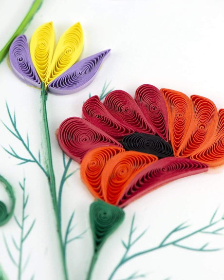 Colorful quilled paper flowers on a white background - okotoks hc pharmacy