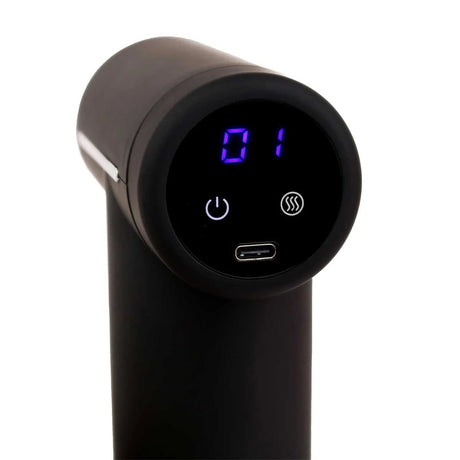 Black handheld device with digital display and control buttons on a white background - okotoks hc pharmacy