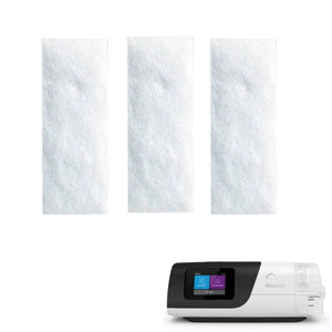 Three white textured filter cartridges shown above a white and black Respironic home oxygen concentrator on a plain white background. - okotoks hc pharmacy