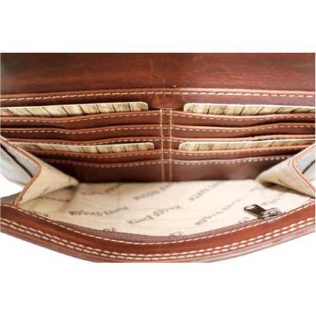 Brown leather wallet with visible stitching and brand name on a white background - okotoks hc pharmacy