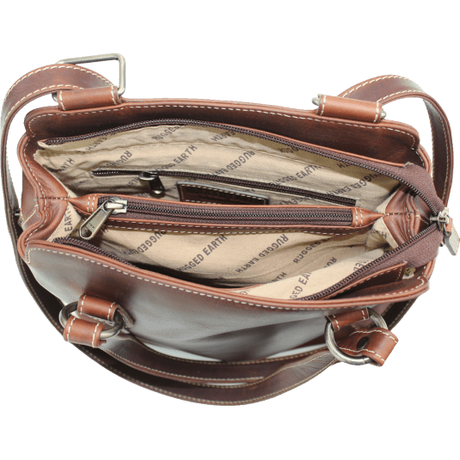 Brown leather handbag with open interior showing zippers and lining. - okotoks hc pharmacy